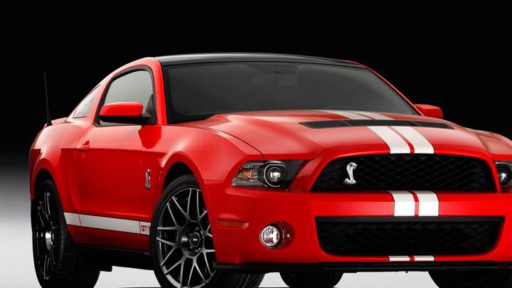 2011 Ford Shelby GT500 SVT Front Side Pose in Red